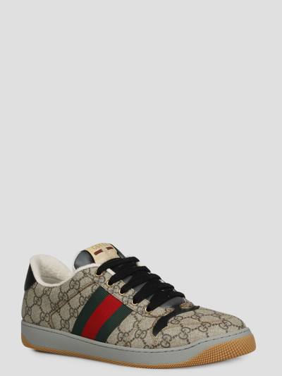 Shop Gucci Screener Gg Sneaker In Brown