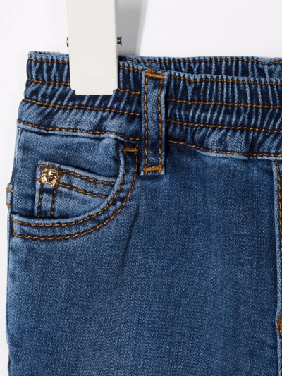 Shop Versace Logo-print Straight Leg Jeans In Blue