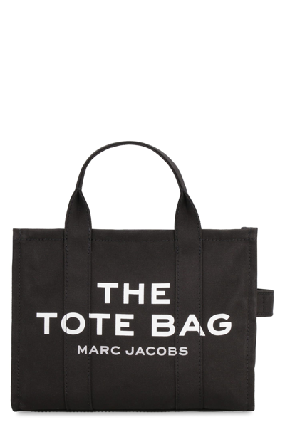 Shop Marc Jacobs The Traveler Canvas Tote Bag In Black