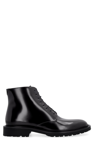 Shop Saint Laurent Leather Lace-up Boots In Black