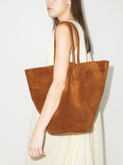 Shop Khaite Whipstitch Suede Tote Bag In Brown