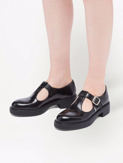 Shop Prada Logo-print Mary-jane Loafers In Black