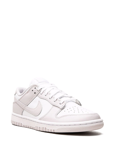 Shop Nike Dunk Low Sneakers In White