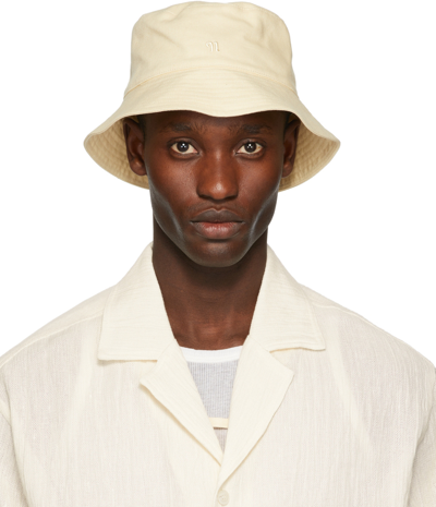 Shop Nanushka Yellow Caran Bucket Hat In Creme