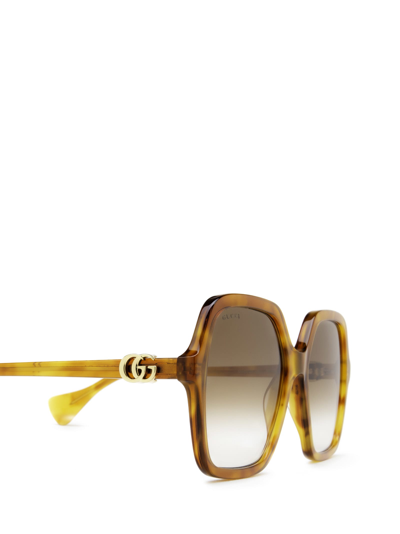 Shop Gucci Eyewear Gg1072s Havana Sunglasses