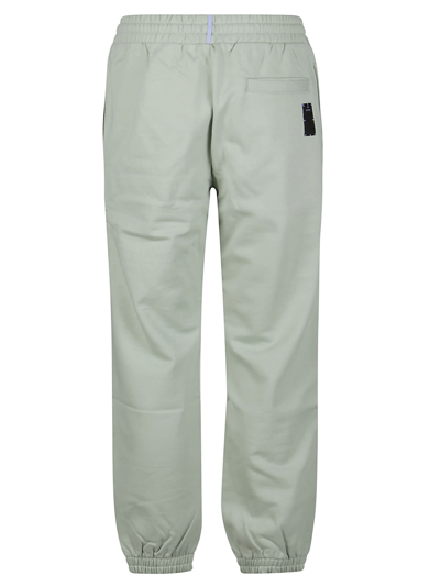 Shop Mcq By Alexander Mcqueen Logo-print Pant In Overcast