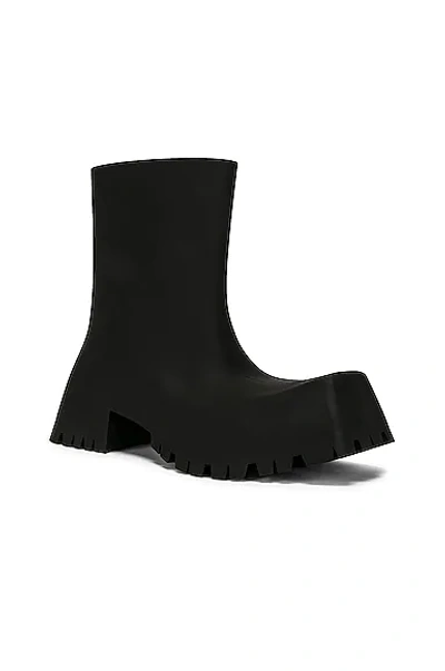 Shop Balenciaga Trooped Rubber Boots In Black