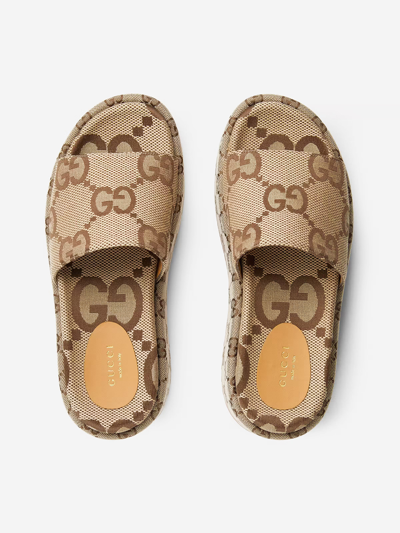 Shop Gucci Gg Slider Sandals In Beige