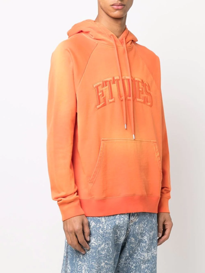 Shop Etudes Studio Logo Drawstring Hoodie In Orange