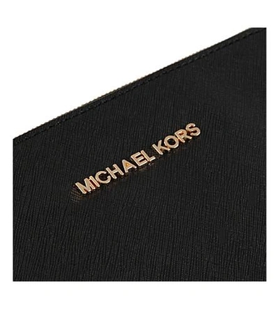 Shop Michael Michael Kors Jet Set Saffiano Leather Clutch In Black