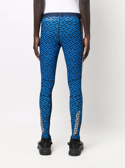 Shop Versace All-over Print Leggings In Blau