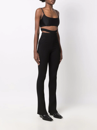 Shop Andreädamo Cut-out High-waist Trousers In Schwarz