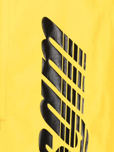 Shop Msgm Logo-print Drawstring Swim Shorts In Gelb