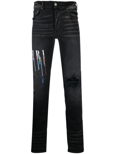 Shop Amiri Logo-embroidered Skinny Jeans In Schwarz