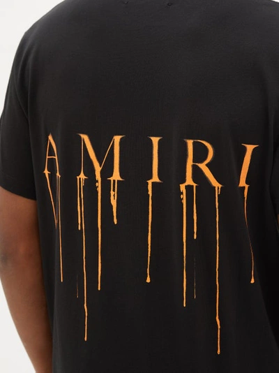 Amiri Black T-shirt w/ Orange drip Logo