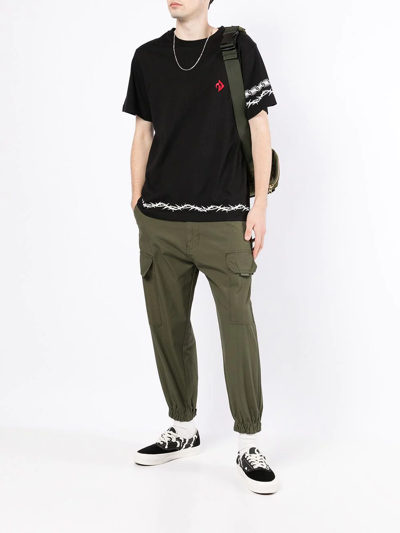 Shop Izzue Army Cargo Tapered Trousers In Green