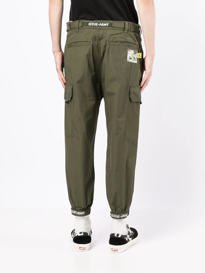 Shop Izzue Army Cargo Tapered Trousers In Green