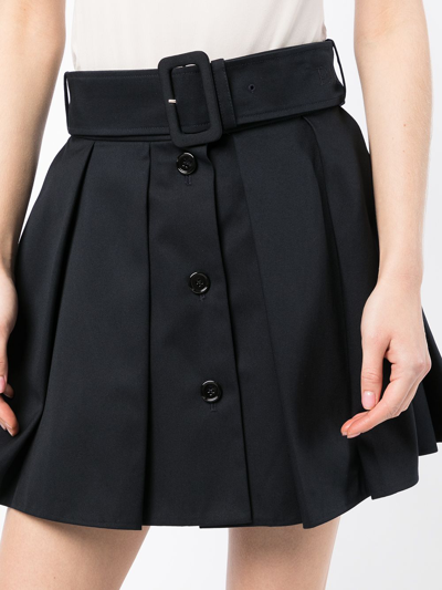 Shop Patou Belted Mini Tennis Skirt In Black