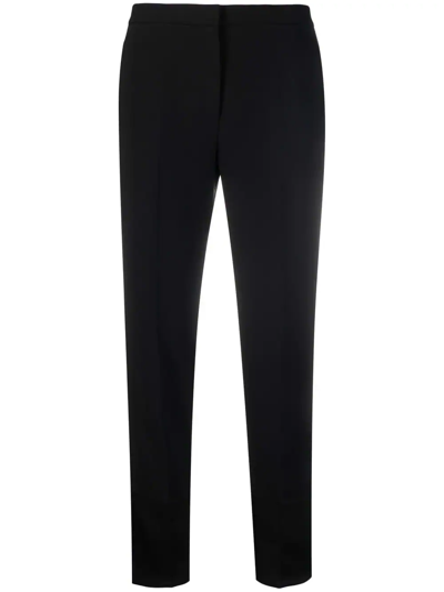 Shop Theory Tapered Tailored Trousers In Black