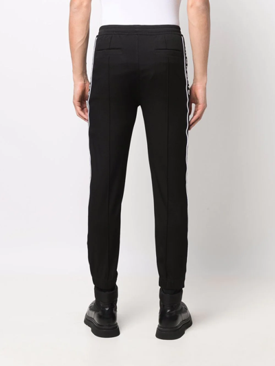 Shop Givenchy Logo-stripe Tapered-leg Track Pants In Black