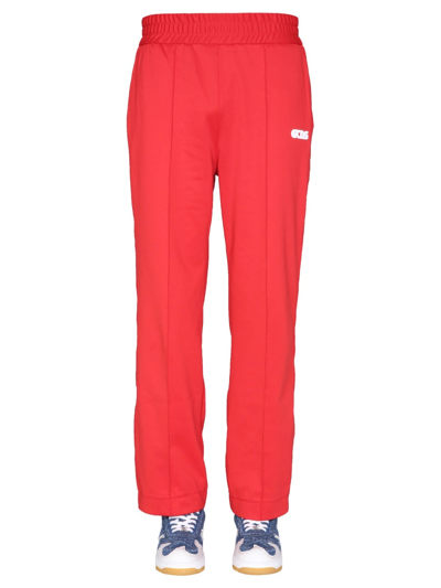 Shop Gcds Jogging Pants With "chain" Print In Red