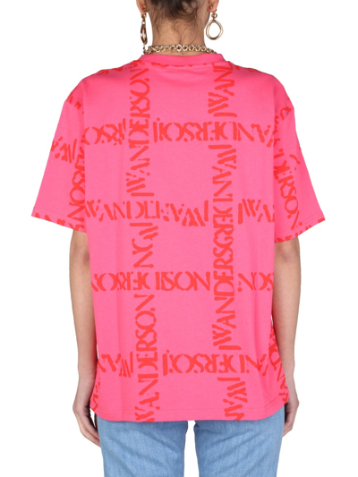 Shop Jw Anderson T-shirt With All Over Logo Print In Fuchsia