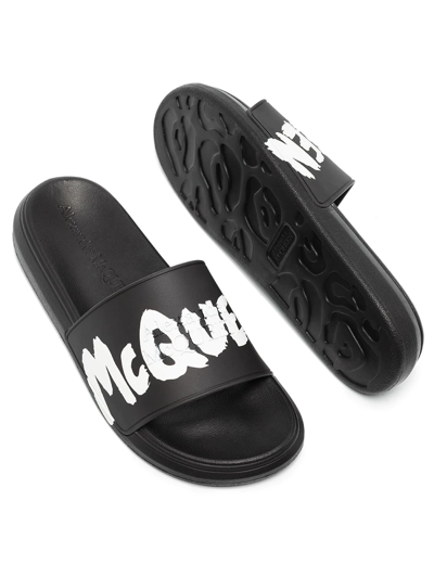 Shop Alexander Mcqueen Graffitii-logo Slip-on Slides In Black