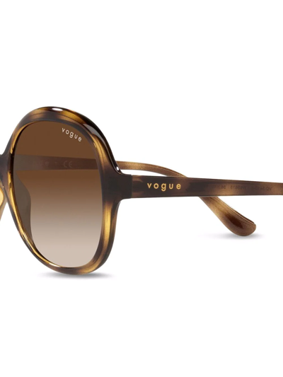 Shop Vogue Eyewear Tortoiseshell Round Frame Sunglasses In Brown