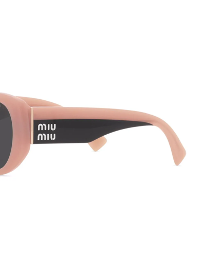 Shop Miu Miu Logo-arm Cat-eye Sunglasses In Pink