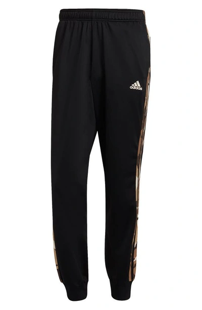 Shop Adidas Originals 3-stripes Tricot Joggers In Black