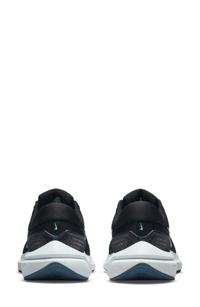 Shop Nike Air Zoom Vomero 16 Sneaker In Black/ Green/ Ghost Aqua