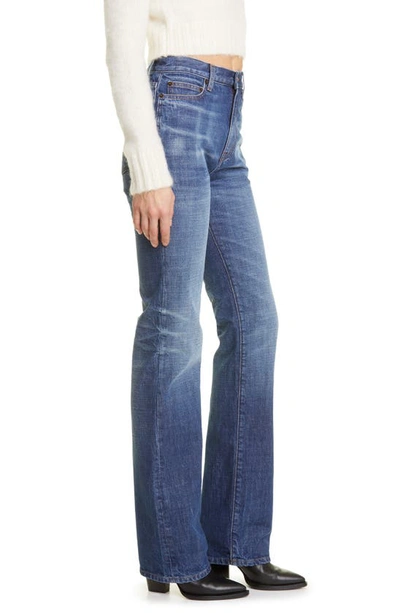 Shop Saint Laurent '90s High Waist Flare Jeans In Dark Bleach Blue