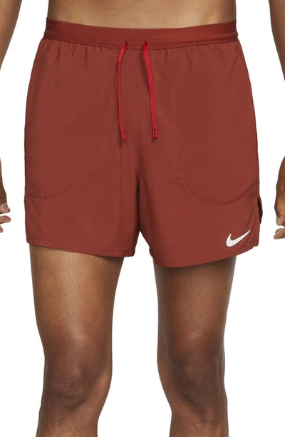 Shop Nike Flex Stride 5 Running Shorts In Rugged Orange