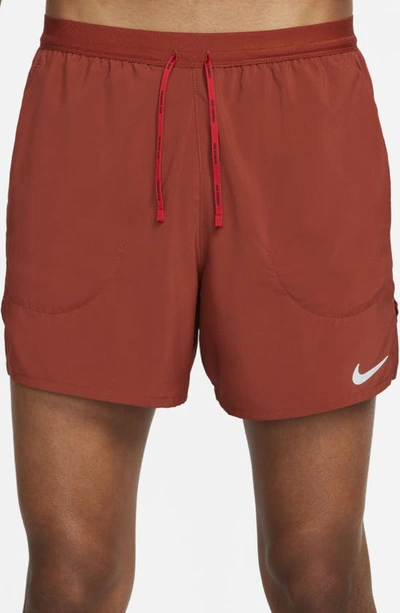 Shop Nike Flex Stride 5 Running Shorts In Rugged Orange