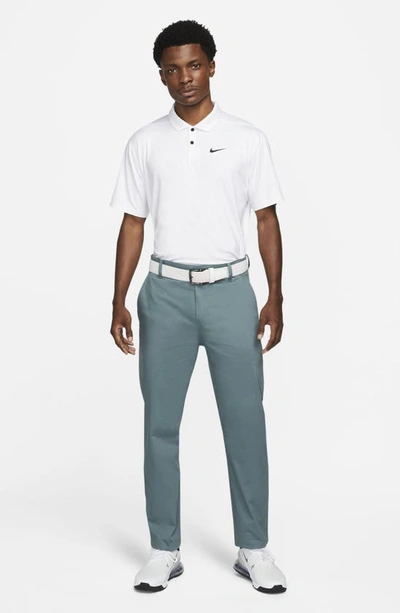 Shop Nike Chino Golf Pants In Hasta