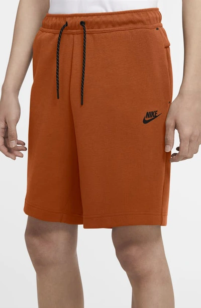 Shop Nike Sportswear Tech Fleece Shorts In Campfire Orange/black
