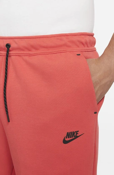 Shop Nike Sportswear Tech Fleece Shorts In Lobster/black