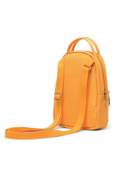 Shop Herschel Supply Co . Nova Crossbody Backpack In Blazing Orange