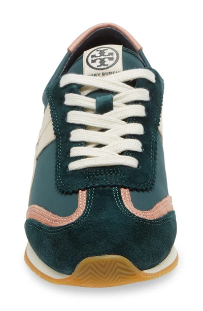 Shop Tory Burch Hank Sneaker In Bottle Green / Pink Moon