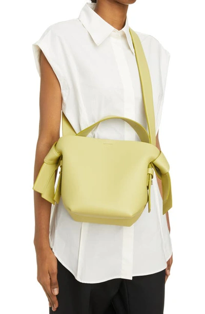 Shop Acne Studios Mini Musubi Leather Top Handle Bag In Apple Green