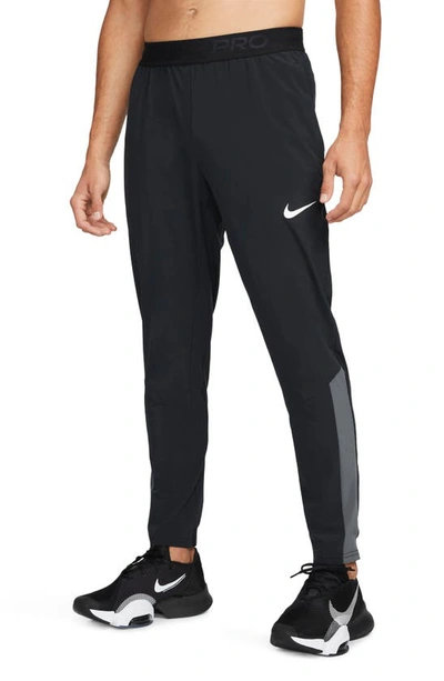 Shop Nike Dri-fit Vent Max Pants In Black/ Iron Grey/ White