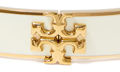 Shop Tory Burch Kira Enamel Hinge Bracelet In Tory Gold / New Ivory