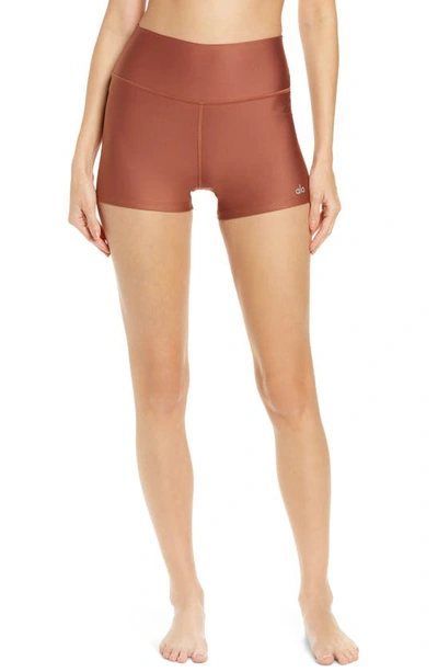 Shop Alo Yoga Airlift High Waist Shorts In Rust