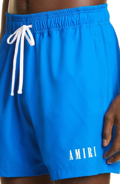 Shop Amiri Core Logo Swim Trunks In Princess Blue