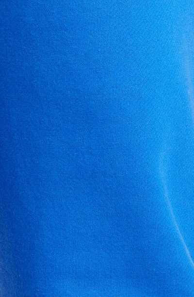 Amiri Paint Drip Logo Joggers in Blue for Men