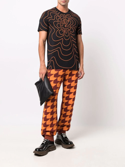 Shop Marni Chevron-jacquard Track Pants In Orange