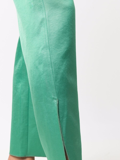 Shop Nanushka Slit Flared Trousers In Green