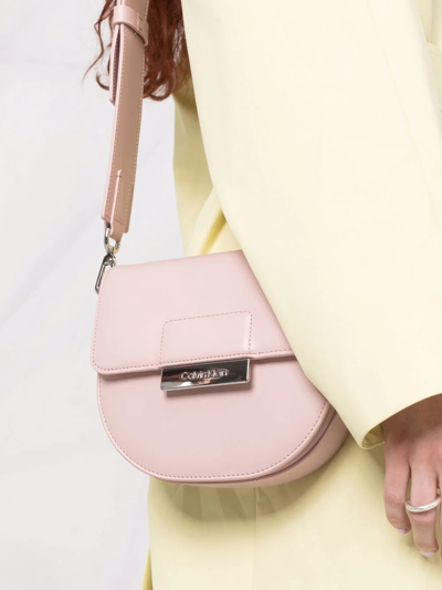Shop Calvin Klein Crossbody Saddle Bag In Pink