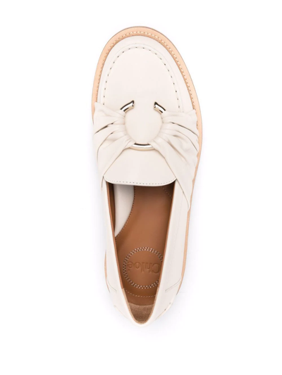 Shop Chloé C-embellished Leather Loafers In Neutrals