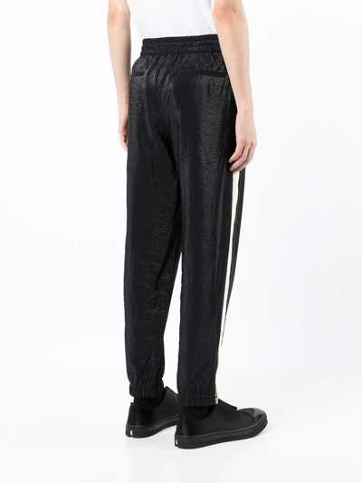 Shop Saint Laurent Side-stripe Track Pants In Black